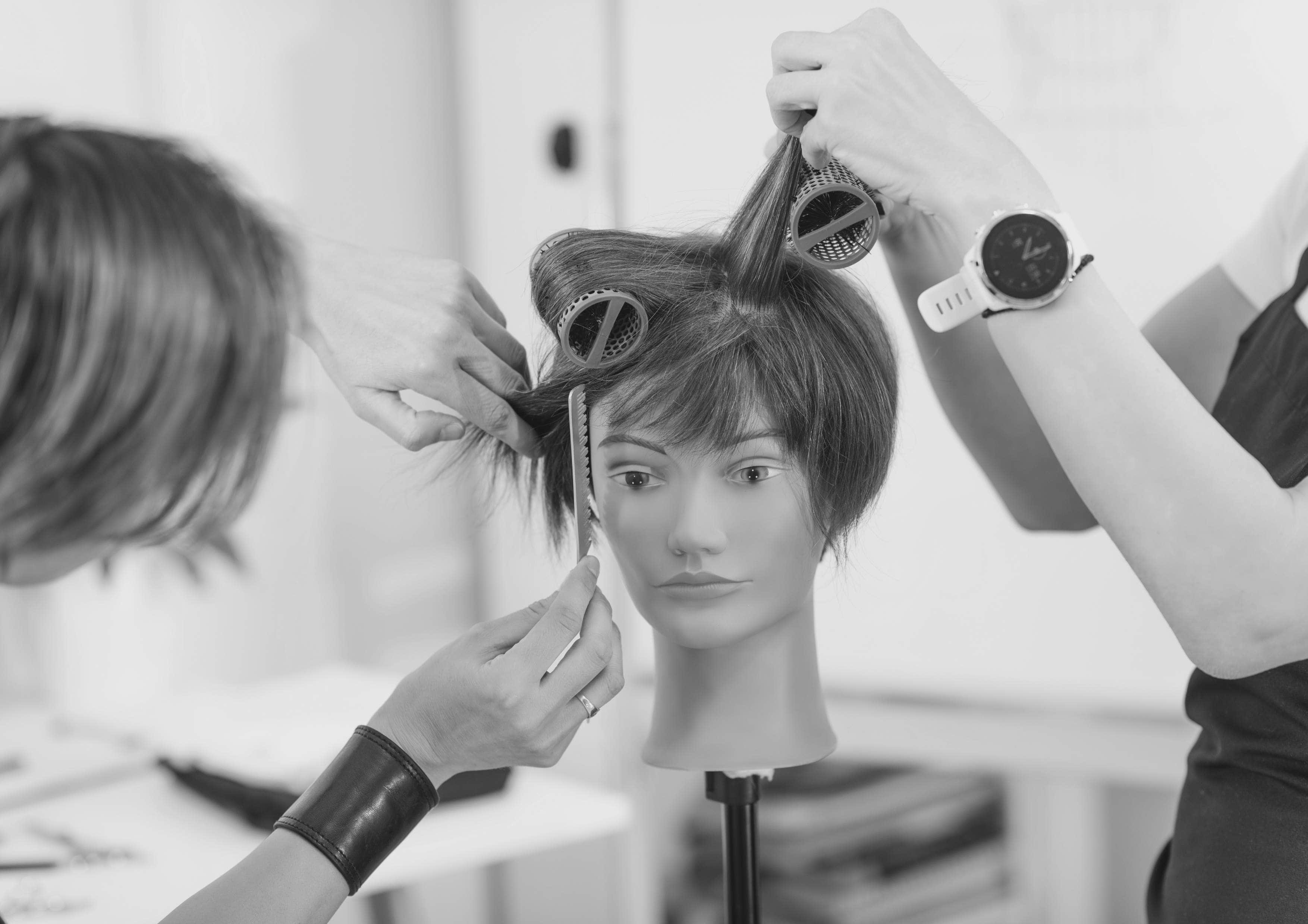 Hair education resources showing cosmetology school classrooms and training programs