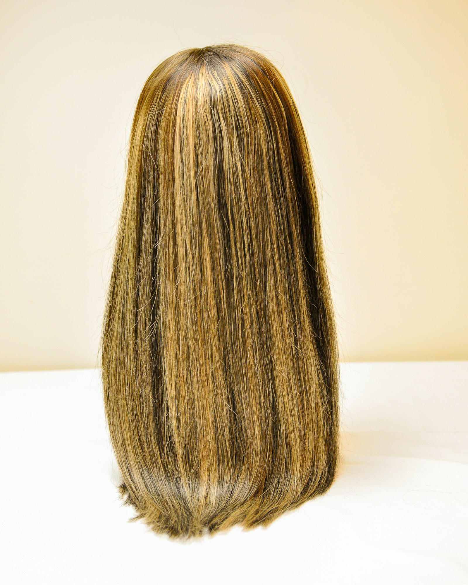 Close-up of sleek straight hair with soft shine