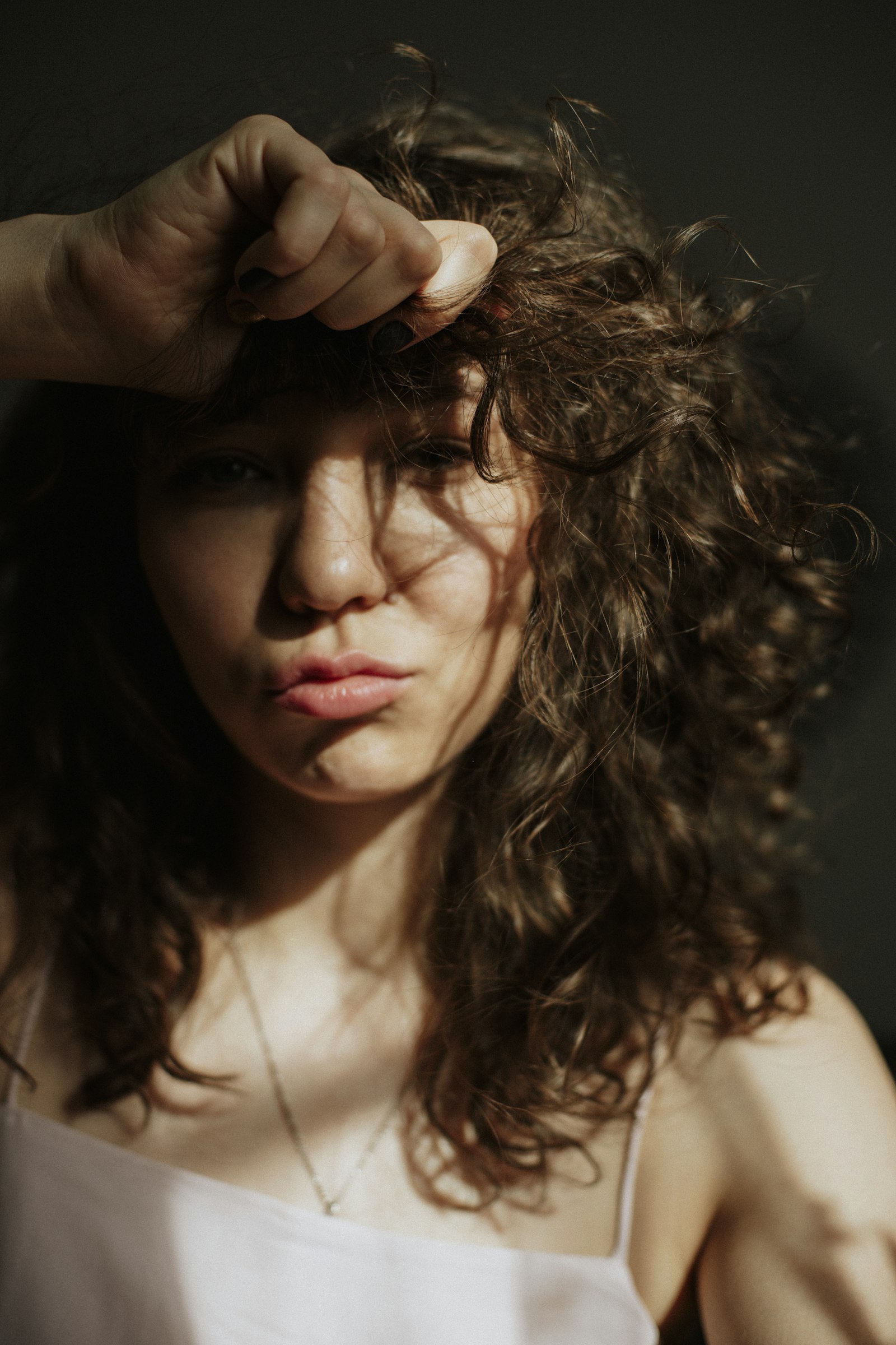 Portrait of a woman with defined ringlet curls