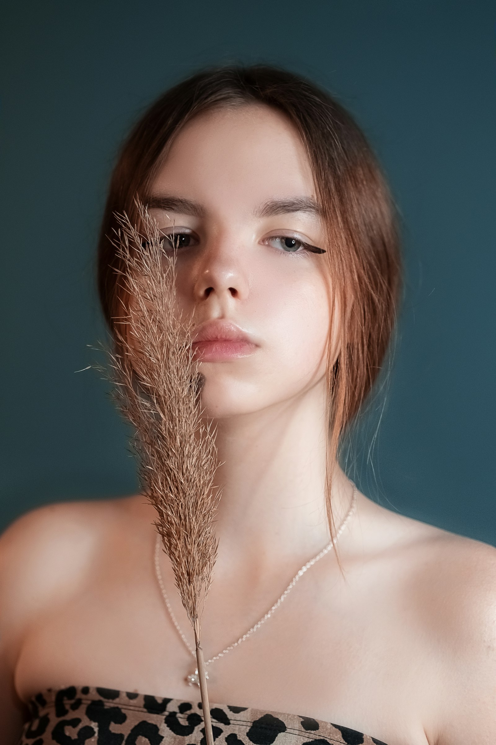 Close-up of tight coily hair framing a face