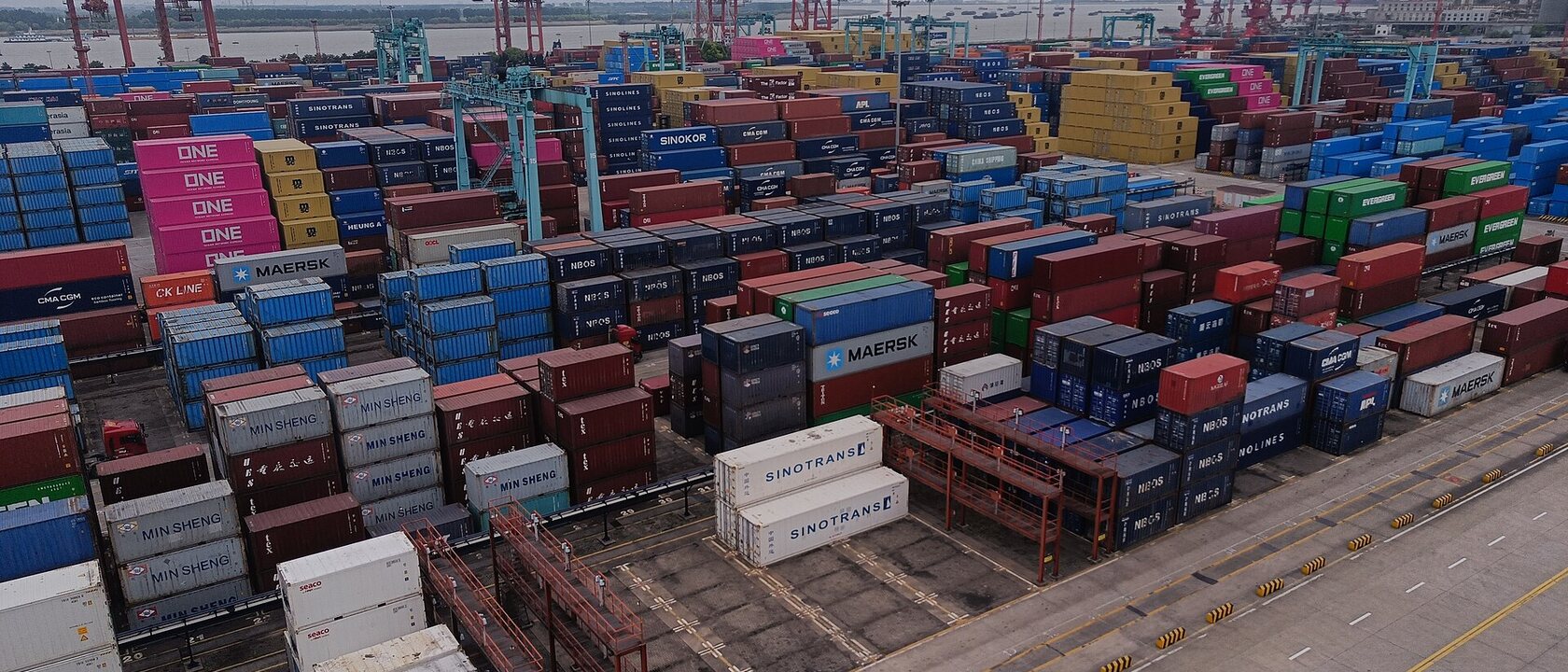 Stacks of shipping containers at Zhangjiagang Container Terminal in Jiangsu Province