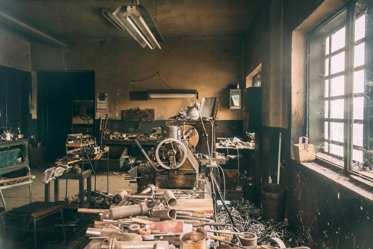 Professional metal workshop with manufacturing tools and equipment