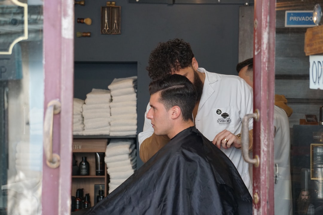 Stylist demonstrating advanced layering on long hair