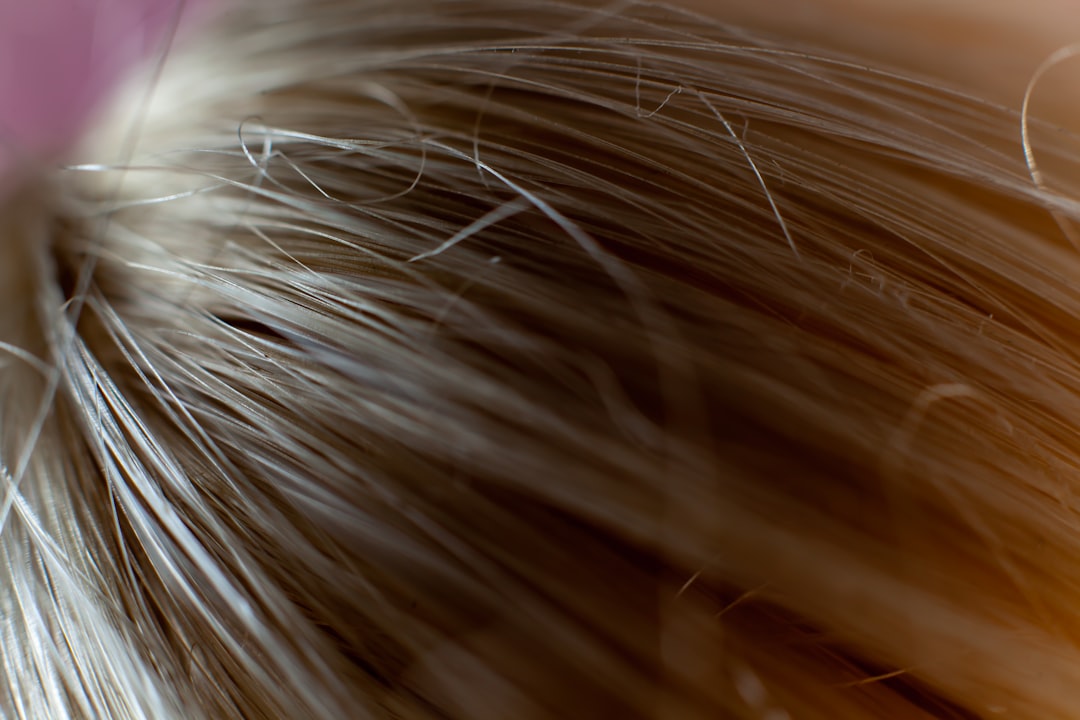 Close view of serrated thinning shears with teeth in focus