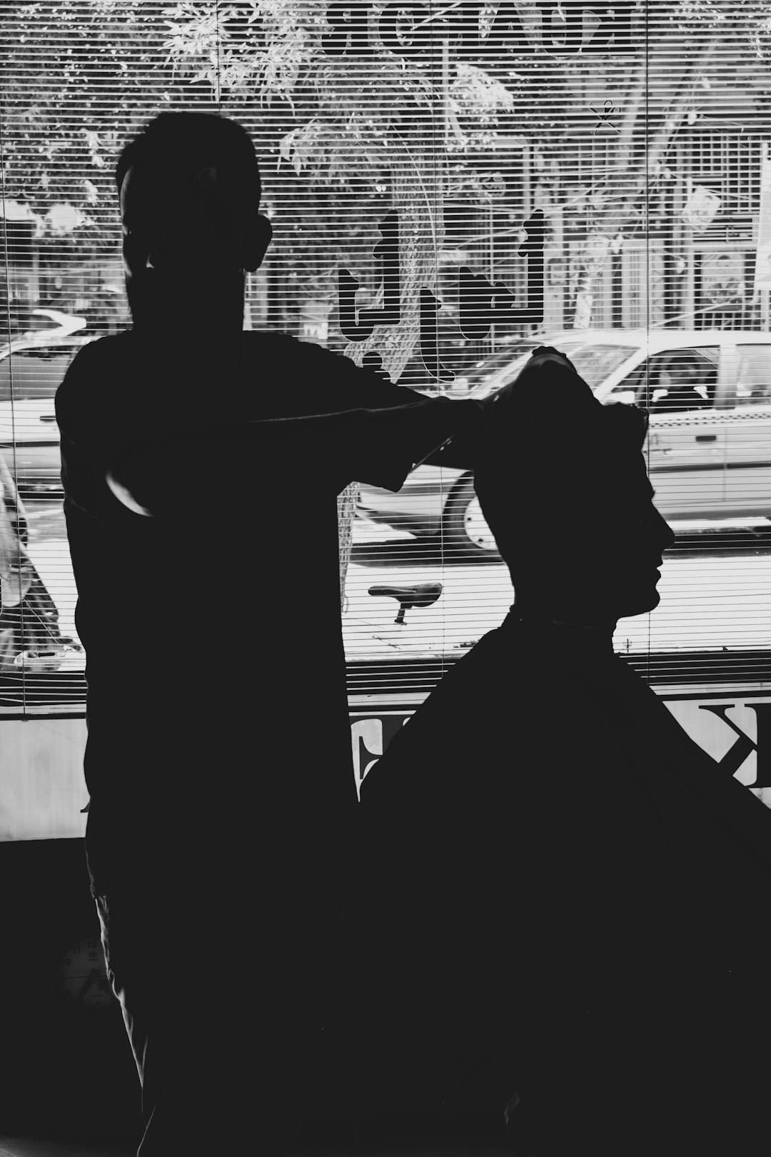 Instructor teaching foundational shear technique on a mannequin