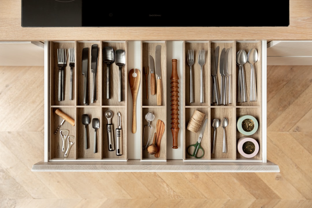 Neatly organized drawer of salon shears and combs