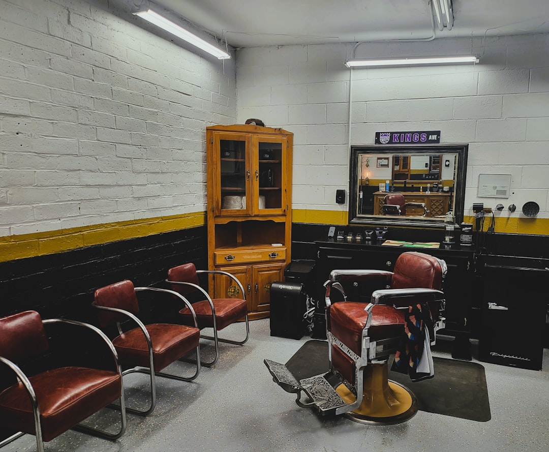 Stylist testing a pair of scissors in a salon showroom